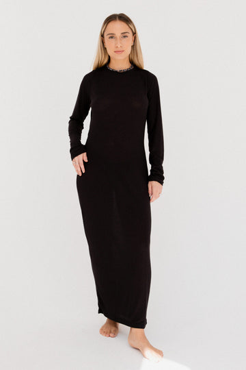 A black dress with an OPEN BACK